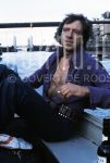 01-01-1978 Ramses Shaffy on location in Amsterdam.

[keywords]Boat, Canal, Half Length[/keywords]